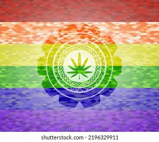 icono de la hoja de hierba dentro del emblema sobre el fondo del mosaico con los colores de la bandera LGBT. 