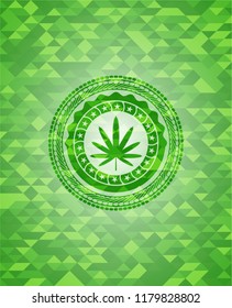 weed leaf icon inside green emblem with mosaic background