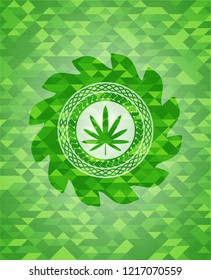 weed leaf icon inside green emblem with mosaic background