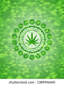 weed leaf icon inside green emblem with triangle mosaic background