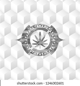 weed leaf icon inside grey badge with geometric cube white background