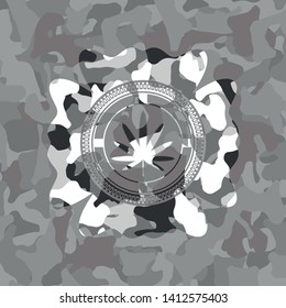 weed leaf icon inside grey camouflaged emblem