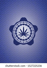 weed leaf icon inside jean or denim emblem or badge background