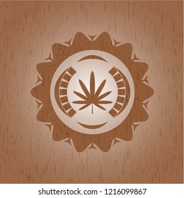 weed leaf icon inside retro wooden emblem