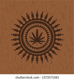 weed leaf icon inside retro wood emblem