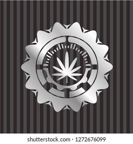weed leaf icon inside silver emblem or badge