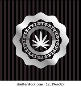 weed leaf icon inside silvery emblem or badge