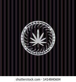 weed leaf icon inside silvery emblem or badge