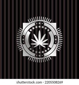 Unkrautblattsymbol in silberglänzendem Emblem. 
