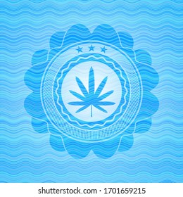 weed leaf icon inside sky blue water wave style badge.