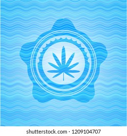 weed leaf icon inside water wavec oncept emblem.