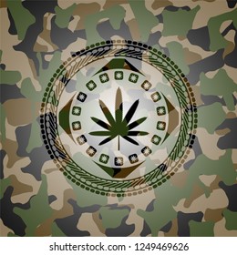 weed leaf icon on camouflaged pattern