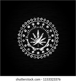 weed leaf icon on chalkboard