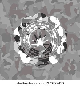 weed leaf icon on grey camouflage texture