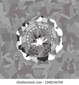 weed leaf icon on grey camo pattern