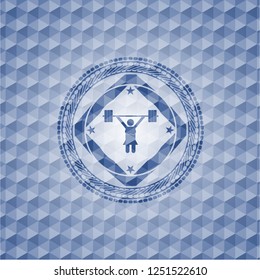 weightlifter girl icon inside blue badge with geometric pattern.