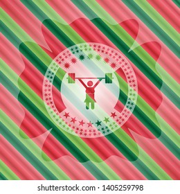 weightlifter girl icon inside christmas emblem.