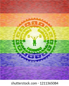 weightlifter girl icon inside emblem on mosaic background with the colors of the LGBT flag