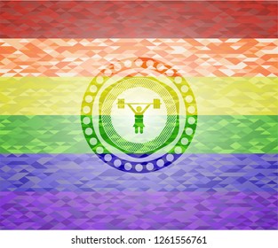 weightlifter girl icon inside emblem on mosaic background with the colors of the LGBT flag
