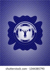 weightlifter girl icon inside emblem with jean background