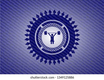 weightlifter girl icon inside emblem with denim texture