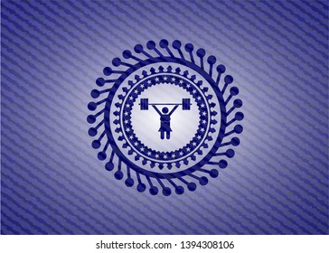 weightlifter girl icon inside jean or denim emblem or badge background