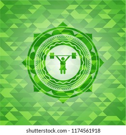 weightlifter girl icon inside realistic green emblem. Mosaic background