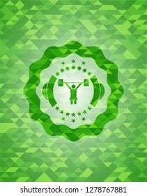 weightlifter girl icon inside realistic green emblem. Mosaic background