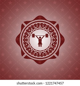 weightlifter girl icon inside red icon or emblem
