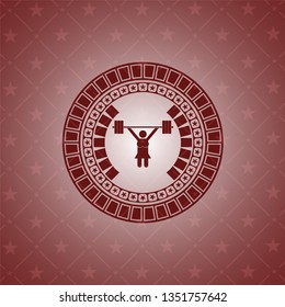 weightlifter girl icon inside red emblem