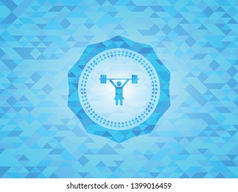 weightlifter girl icon inside sky blue mosaic emblem