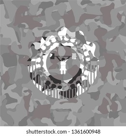 weightlifter girl icon on grey camo texture