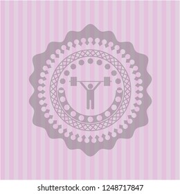 weightlifting icon inside badge with pink background