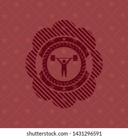 weightlifting icon inside badge with red background