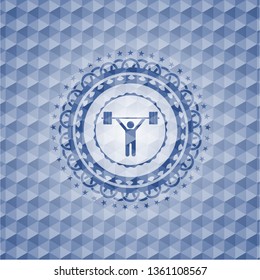 weightlifting icon inside blue emblem with geometric pattern background.