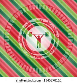 weightlifting icon inside christmas colors emblem.