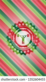 weightlifting icon inside christmas colors style emblem.