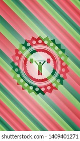 weightlifting icon inside christmas colors style badge.