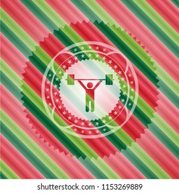 weightlifting icon inside christmas style emblem.