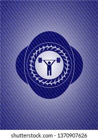weightlifting icon inside emblem with denim texture