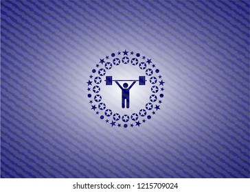 weightlifting icon inside emblem with jean texture