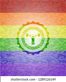 weightlifting icon inside emblem on mosaic background with the colors of the LGBT flag