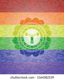 weightlifting icon inside emblem on mosaic background with the colors of the LGBT flag