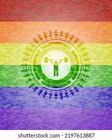 weightlifting icon inside emblem on mosaic background with the colors of the LGBT flag. 