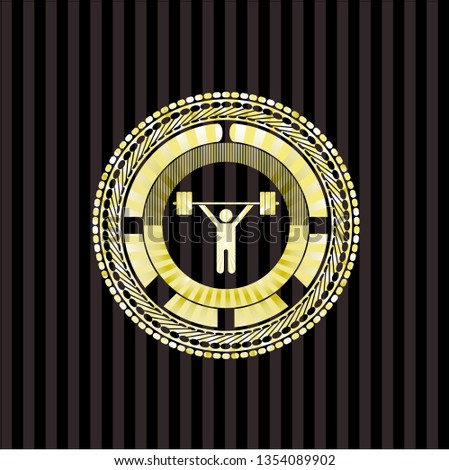 weightlifting icon inside gold emblem or badge
