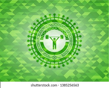 weightlifting icon inside green emblem with mosaic ecological style background