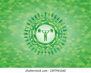 weightlifting icon inside green emblem with mosaic ecological style background