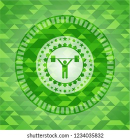 weightlifting icon inside green mosaic emblem