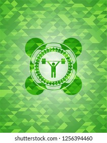 weightlifting icon inside green mosaic emblem