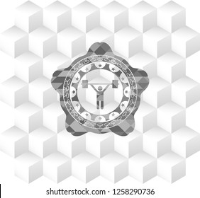 weightlifting icon inside grey badge with geometric cube white background